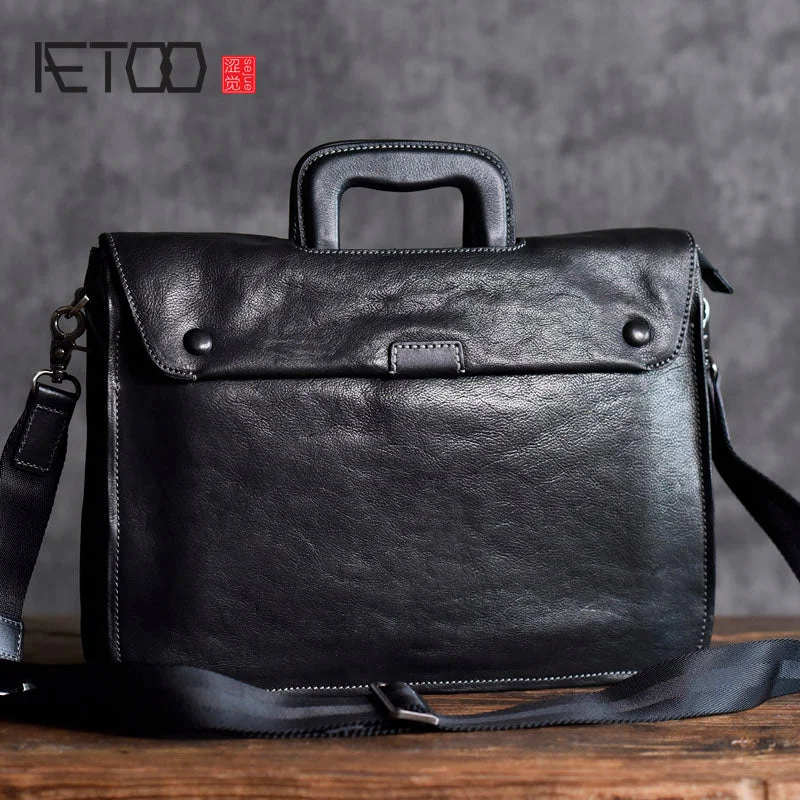 versatile briefcase with front compartments for accessories -Aetoo The First Layer Of Vegetable Tanned Cowhide Briefcase Men And Women Business Leather